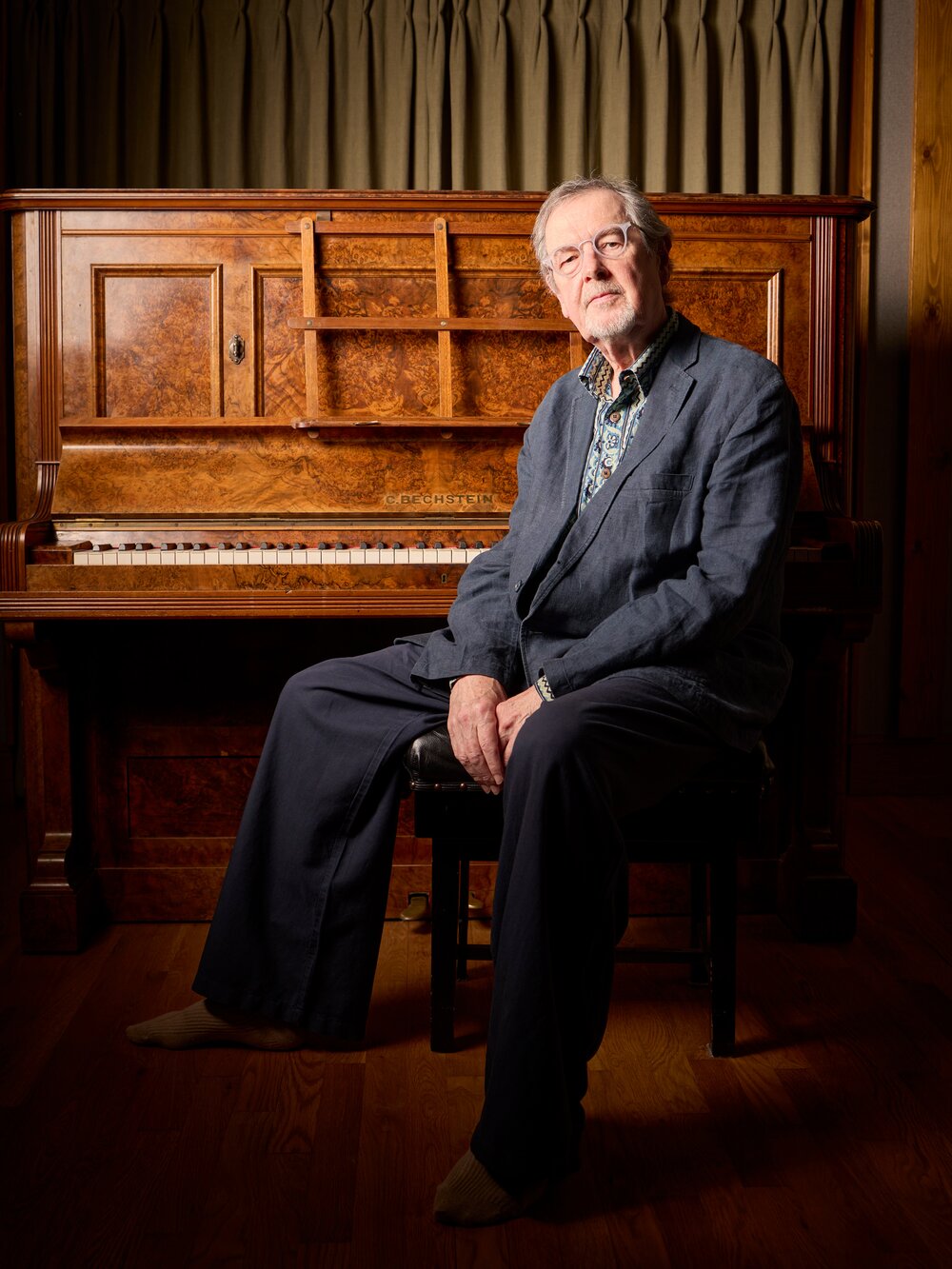 Richard Harvey at an upright piano