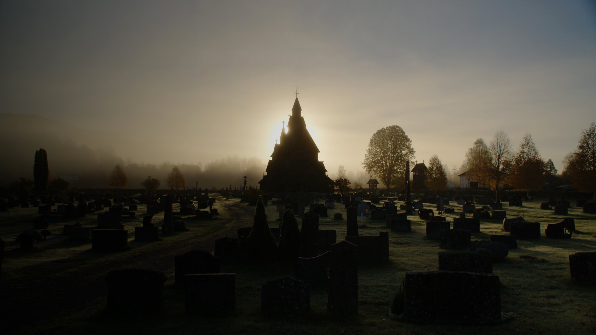 A stave church at sunrise