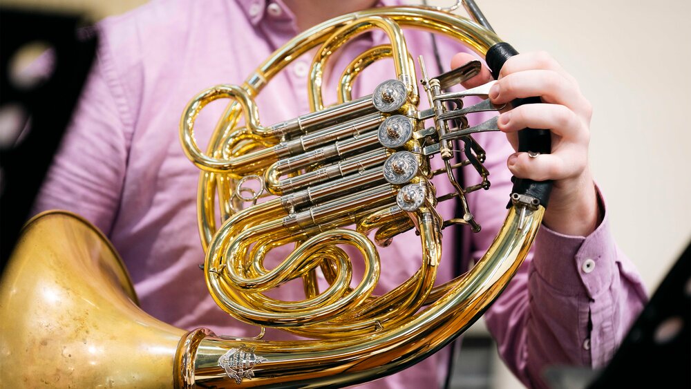 A close-up of a French horn