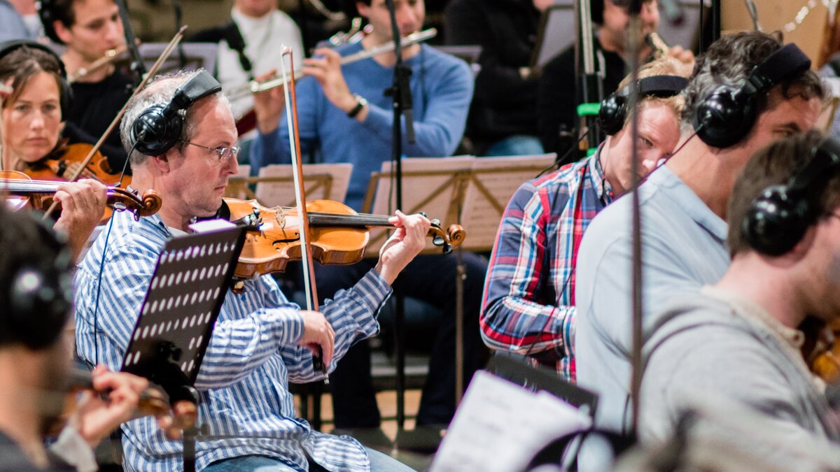 An orchestra in a recording session