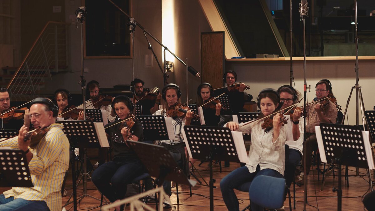 Recording a symphonic string section. Photo by Robin Lambrecht.