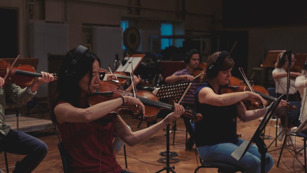 Recording violas and violins in a symphonic string section. Photo by Robin Lambrecht.
