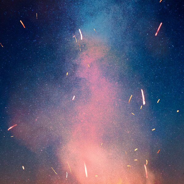 Abstracted image of sparks against a night sky