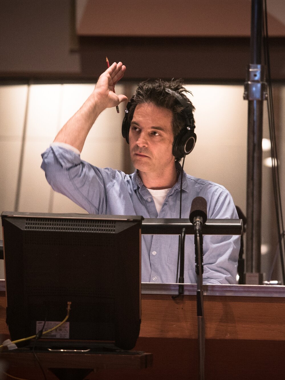 Composer Jeff Russo conducting a recording session